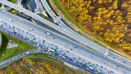 Drone flies over the road urban junction. Highway in Moscow.