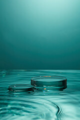 Front view of transparent podium and blank space in blue water background