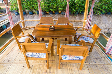 Empty table and chair decoration in restaurant interior
