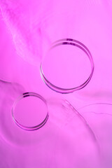 Top view of transparent podium and blank space in violet water background