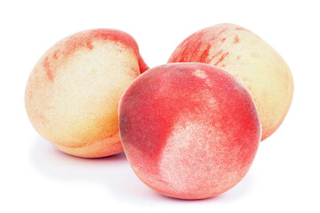 Ripe peaches on a white background.