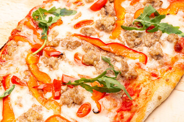 Delicious pizza served on wooden plate. Concept for advertising flyer and poster for restaurants or pizzerias, template with delicious taste of pepperoni.