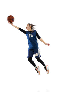 Full-length dynamic studio shot of young girl, basketball player in blue uniform training isolated over white studio backgroud. Finger roll