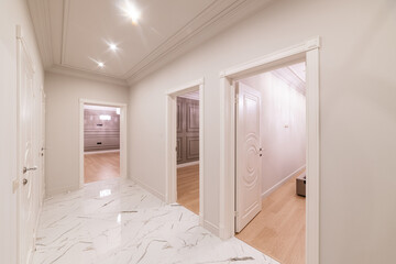 Fototapeta na wymiar bright corridor interior with light tile doors and mirror