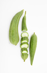Fresh Angled loofah (Ribbed Gourd) sliced isolated on white background.