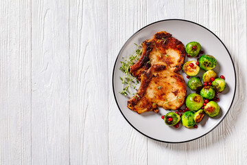 Fototapeta premium bone in loin chops with brussel sprouts