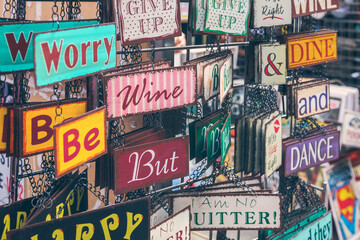 Decorative hanging signs at Brick Lane market in London