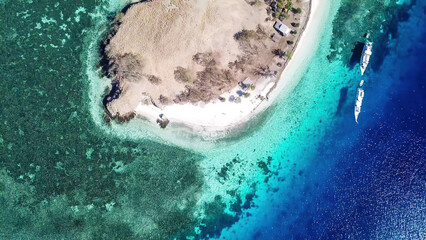 Top down drone shot of paradise island in Komodo National Park, Flores, Indonesia. The island has...