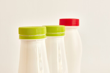 Plastic bottles for drinks on a white background. Plastic packaging. Disposal of plastic. Plastic recycling. Plastic garbage.