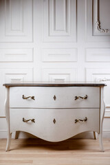 vintage chest of drawers on a light background