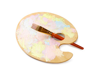 Wooden artist's palette with mixed pastel paints and brush isolated on white