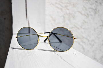 Gold frame sunglasses