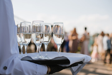 Glasses of champagne for a welcome drink at a party or wedding - 500411504