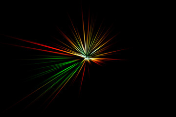 Abstract surface of blur radial zoom in green and orange colors on a black background. Bright colorful background with radial, diverging, converging lines