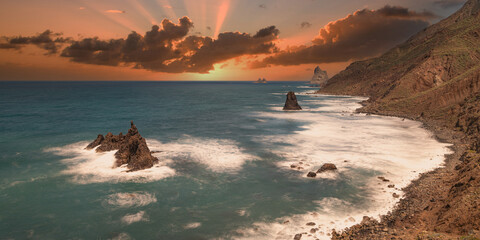 stunning sunset from the beach of benijo in tenerife. Travel concept of famous and beautiful...