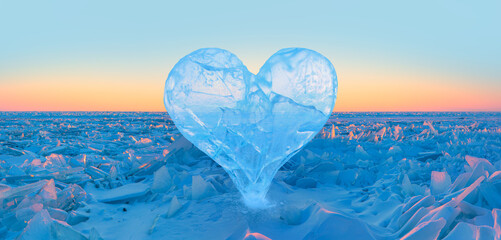 Icy heart in a crack in the light of sunset. lake Baikal, Siberia