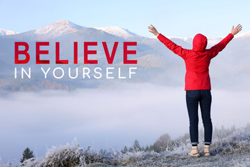 Motivational quote Believe In Yourself. Text near tourist in mountains