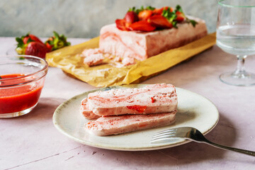Italian strawberry dessert Semifreddo with sauce - cold dessert like an ice-cream. Selective focus