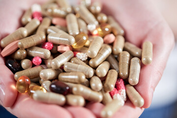 pills on the woman's hands