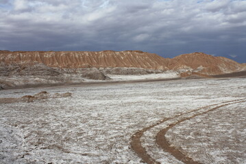 Landscape Or Mountains, sand, mountains And clounds At Atacama Desert In Chile