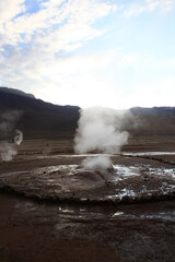 Freezing daybreak in the Geiseres de Tatio, a natural spectacle. Atacama Desert, Chile.