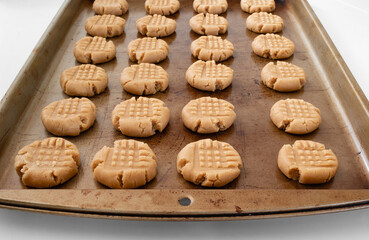 Peanut butter cookie dough on baking sheet