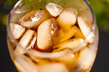  Ice cubes in cola beverage