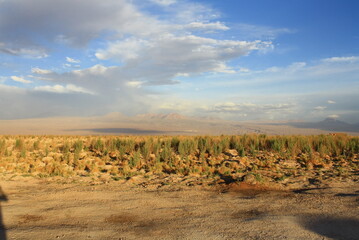 Landscape Or Mountains, sand, volcano And clounds At Atacama Desert In Chile