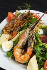 Langoustines dish on a plate in a cafe, seafood delicacies.