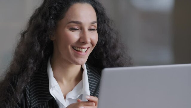 Happy hispanic business woman worker customer support agent call friends have virtual video meeting on webcam smiling arabian female student explain project study with online teacher at home office