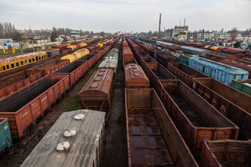 Fototapeta na wymiar Freight and passenger trains at Kherson railway station in Ukraine.