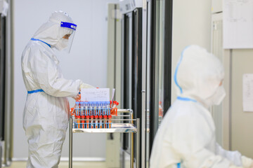 Medical workers are receiving nucleic acid test samples at a medical point, North China