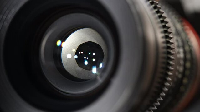  Close-up Lens Aperture Blades Opening. Turning Aperture Ring on Lens. Flare on Optical Lens Glasses