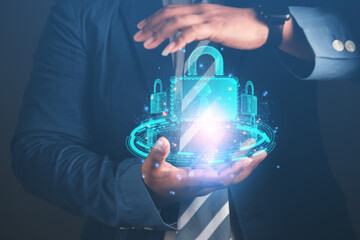 cybersecurity concept Business man shows how to protect cyber technology network from attack by hackers on the internet. Secure access to privacy through smartphones Meta protection.
