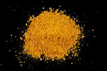Curry powder seasoning black background