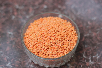 Closeup shot of lentils on glass bowl