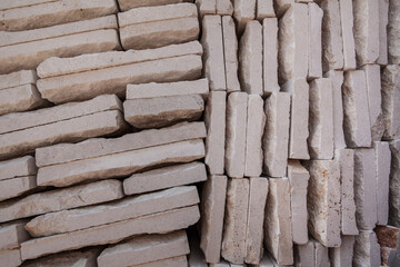 Stacked stones. Stone texture. Many stones. Regular. Abstract texture and background