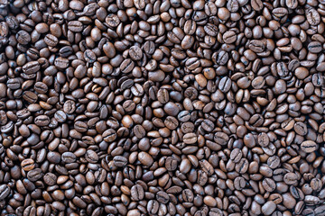 Background of fresh roasted coffee beans, close up, top view