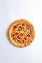 Homemade pizza with cheese and minced meat. On a white background.