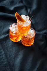 Italian traditional cocktail Aperol Spritz with orange