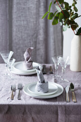 Home decor concept with linen tablecloth and linen napkin