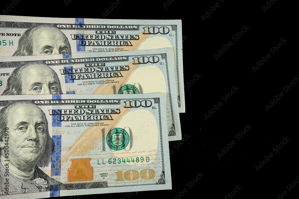 Poster one hundred dollars cash on black background