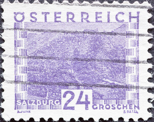 Austria - circa 1930: a postage stamp from Austria, showing a landscape in Austria. Hohensalzburg...
