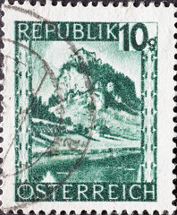 Austria - circa 1945 : a postage stamp from Austria, showing a landscape in Austria: Hochosterwitz...