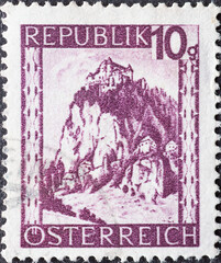 Austria - circa 1947 : a postage stamp from Austria, showing a landscape in Austria: Hochosterwitz (Carinthia)