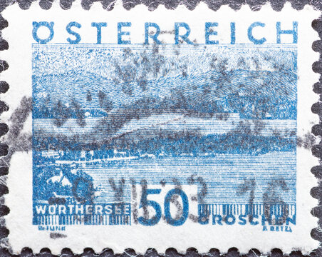 Austria - circa 1930: a postage stamp from Austria, showing a landscape in Austria. Worthersee, Carinthia