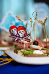 different bouquets and sandwiches at an event with pirates