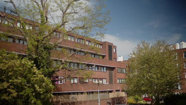 London council estate high rise apartment block on sunny summer day