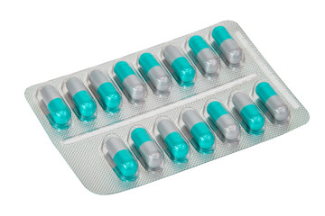 Medical pills blue in blister isolated on the white background
