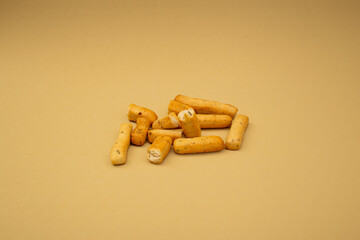 Grassini slide on a beige background